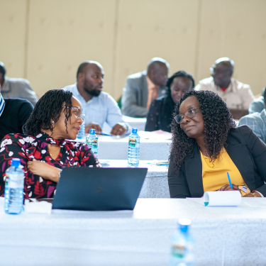 Training participants chatting during a workshop